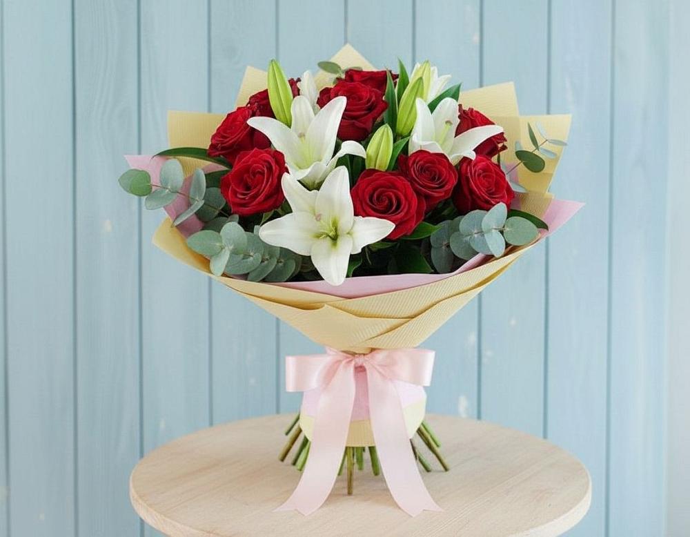 Букет цветов из: Лилии и Розы в Осе